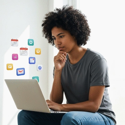 Person using a laptop with various productivity app icons floating around, symbolizing an efficient digital workflow